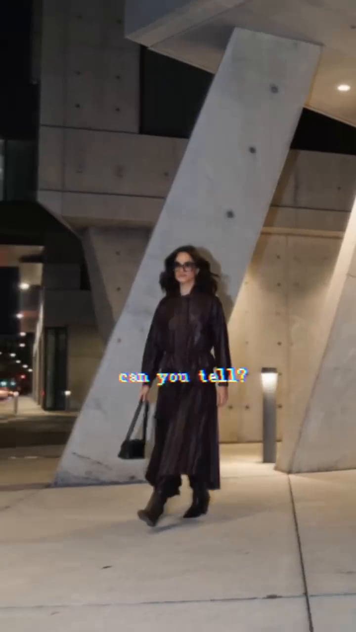 Frame do fashion film mispace, criado no OUR SPACE Studio · look escuro em arquitetura brutalista